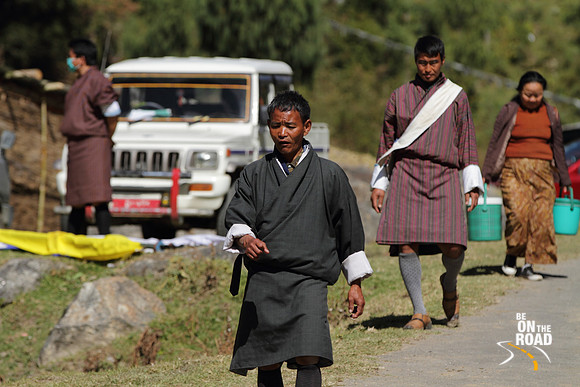 Bhutanese Local Man walks down the streets of Trongsa, Bhutan
