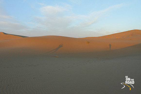 Shadows on the sand dunes of Verzaneh, Iran