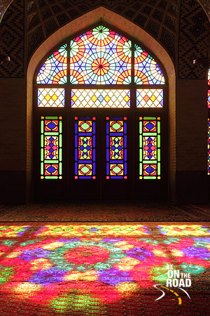 Colourful window and its colourful reflection at Nasir-Al Mosque, Shiraz, Iran