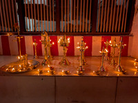 Variety of lamps being lit in the portico of houses at Kallidaikurichi