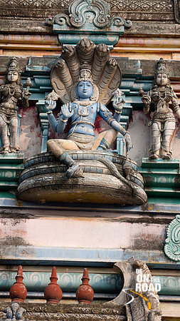 Statue of Vishnu and Kalinga on the Raja Gopuram of Thiruppudaimarudur Temple