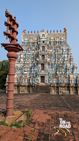 The sthamba and the raja gopuram at Thiruppudaimarudur temple