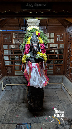 Ganesha Statue on pillar at Agneeswarar Temple, Rajavallipuram