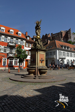 Statue at Marketplatz and Heidelberg Castle in the background