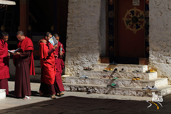 Buddhist monks in deep study at Simtokha Dzong, Bhutan