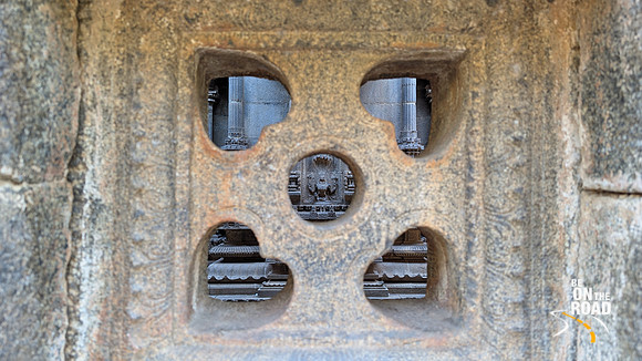 Beautiful view of the exquisite bas reliefs and sculptures from a window at Bhaktavatsala Perumal Temple, Cheranmahadevi
