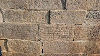 Pandya and Chola era inscriptions on the stone walls of Bhaktavatsala Perumal Temple, Cheranmahadevi