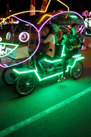 Locals enjoy a ride in dazzling cycle carts at Jogja, Indonesia