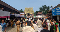 Following appropriate dress code while entering the famous Padmanabha Swamy Temple of Thiruvananthapuram, Kerala
