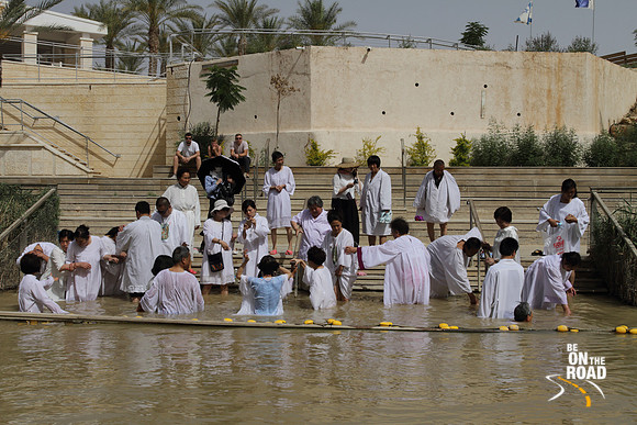 Pilgrims getting baptized at Bethany on the Israel side of the Jordan river