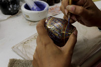 Beautiful Benjarong crockery being designed near Ban Amphawa, Thailand
