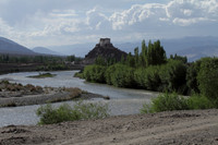 Ladakh's Stok Palace as seen from the banks of the Indus river