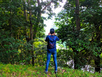 Photographing the scenic Karaiyar Dam inside Kalakad Mundanthurai Tiger Reserve