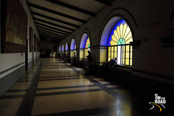 Corridor of colourful windows in St. Augustine's Church, Manila, Philippines