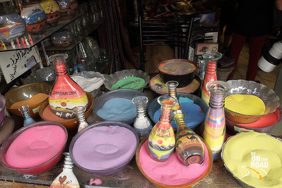 The rich concoction of colors that go into a Jordan sand art souvenir at Amman, Jordan