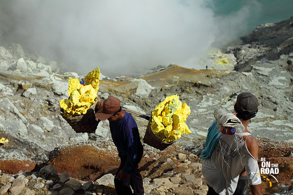 These sulphur miners carry more sulphur than their body weight