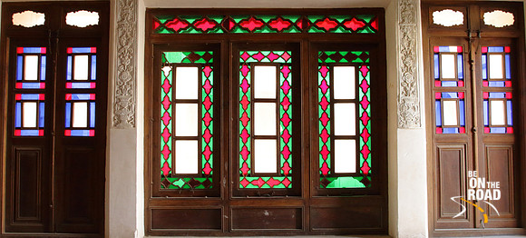 Colorful glasswork on the doors of Tabatabei house of Kashan, Iran