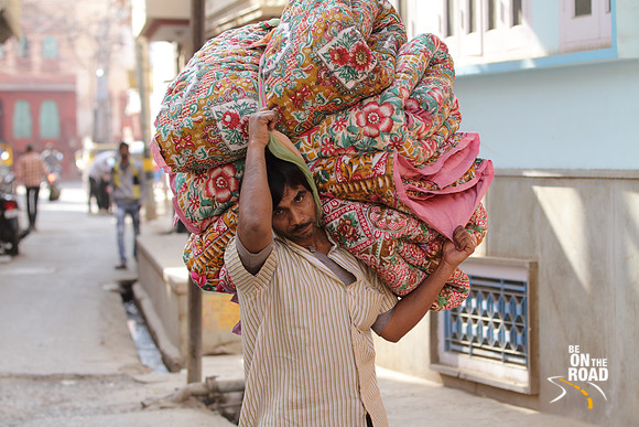 The man and his colorful Rajais, Bikaner, Rajasthan, India