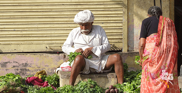 Vegetable vendor in front of Govind Devji temple, Jaipur, Rajasthan, India