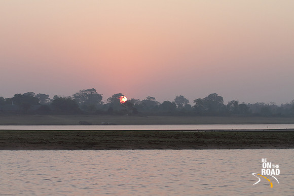Sunrise over the Kabini Reservoir as seen during a morning boat safari