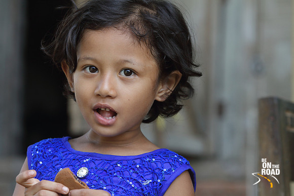 The cookie goobler - Girl from Mishing Tribal Village, Assam, India