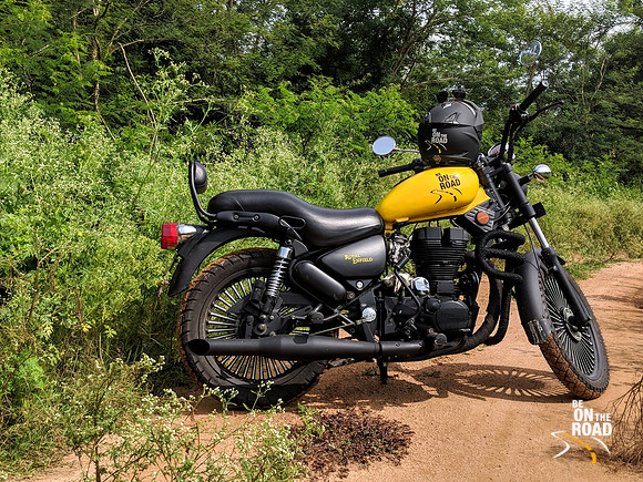 Custom Royal Enfield Motorcycle and the lush nature near Manchinebele Dam