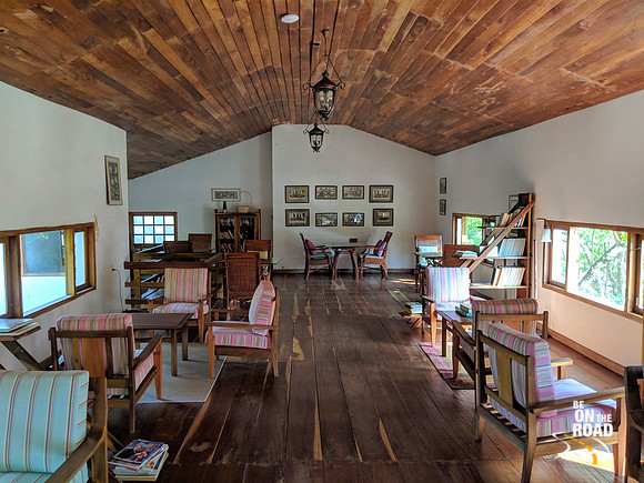 The warm interiors of the library at Windermere Estate, Munnar