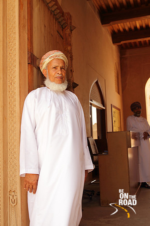 Elderly Omani Man at the entrance of Jabreen Castle, Oman