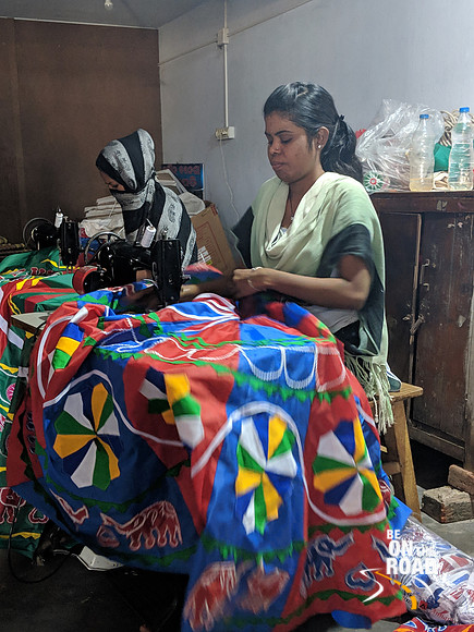 Artisans stitching the chandua work at Pipli, Odisha