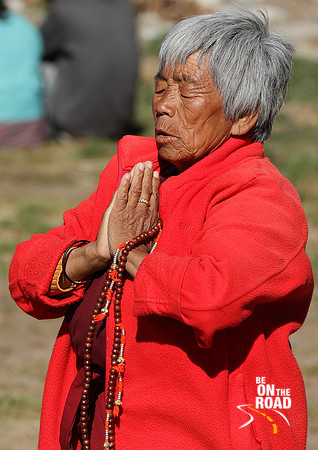 Bhutanese Woman in prayer