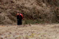 An elderly woman climbs the steep slopes of Dorjeeling village, Arunachal Pradesh