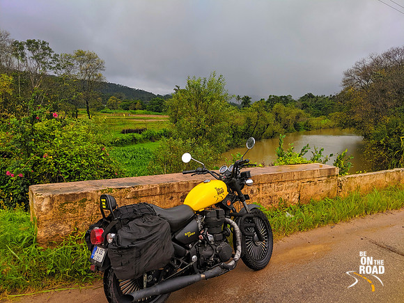 My bike, the lush environment and the dark monsoon clouds