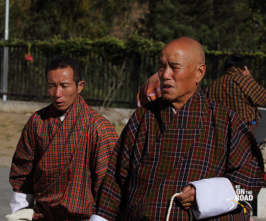 Bhutanese men offering their prayers at Memorial Choerten, Thimphu