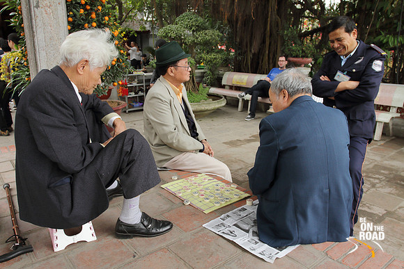 Vietnamese Chinese Checkers being played on the streets of Hanoi, Vietnam