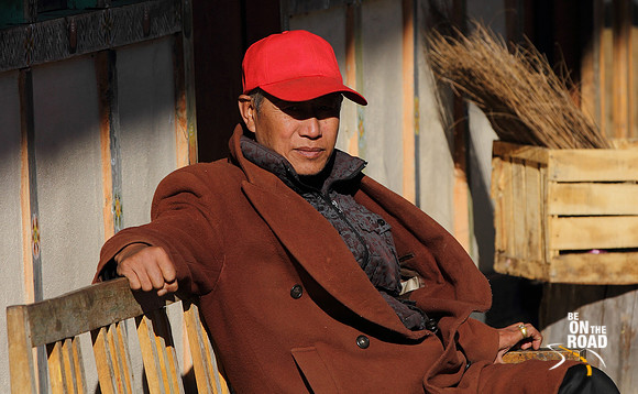 A local Bumthang man enjoying the winter sun's warmth