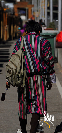 A Bhutanese man walks on in Thimphu, Bhutan