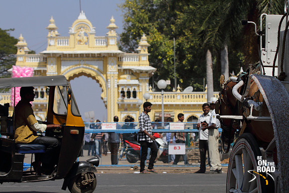 Horse cart, Autorickshaw and street life in front of Mysore Palace, Karnataka, India